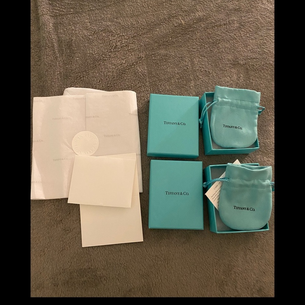 Tiffany & Co. box with pouches, wrapping paper, and imprinted Tiffany & Co. card